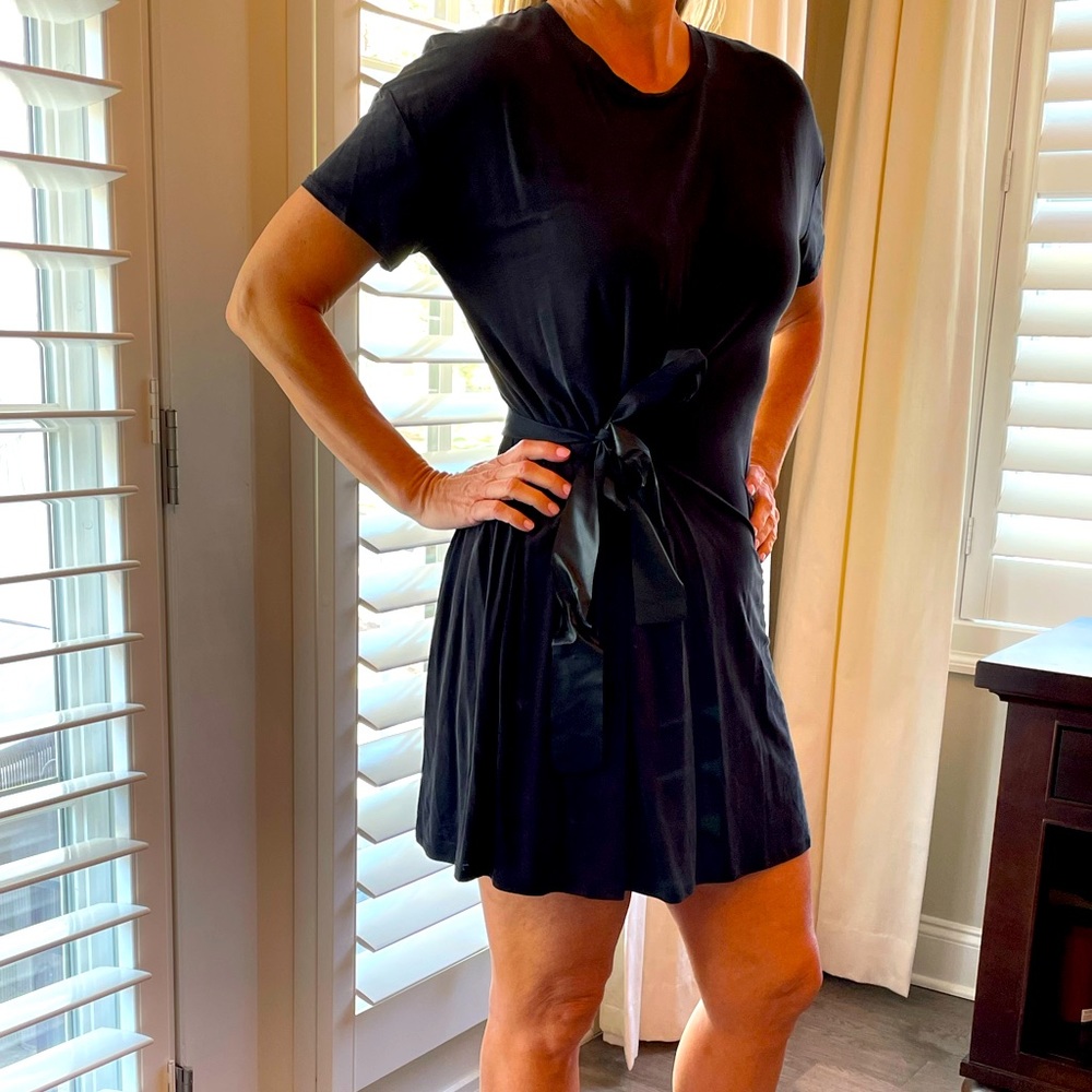 Black pullover dress with faux leather side tie